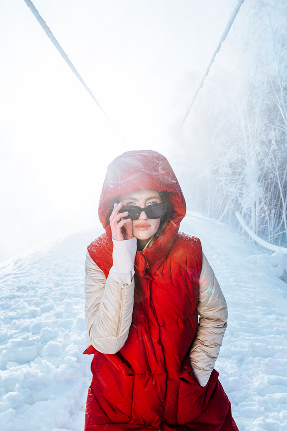 Oversized down jacket "Laura" with a hood, red color