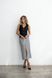 Skirt with a cut, color of a houndstooth m